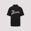 Amiri Striped Merino Wool Polo Shirt In Black