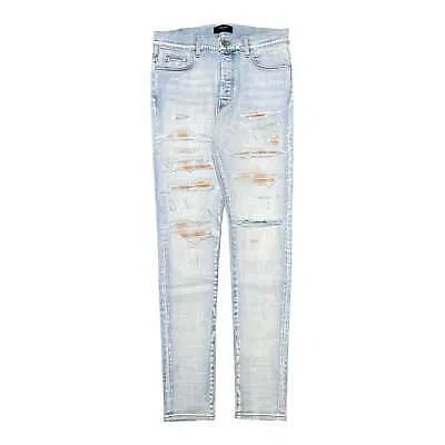 Pre-owned Amiri Plaid Patch Thrasher Jeans Light Indigo In Blue