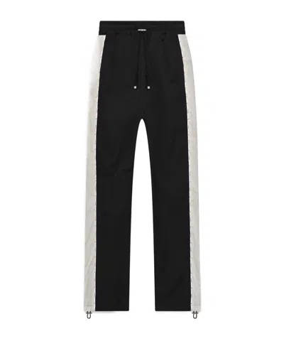Amiri Raglan Ma Logo Sweatpants In Black