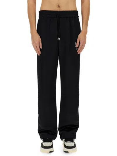 AMIRI RELAXED FIT BLACK PANTS WITH EMBROIDERY