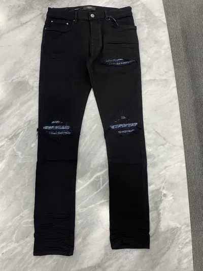 Amiri Ripped Jeans In Black