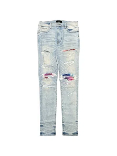 Amiri Ripped Jeans In Blue