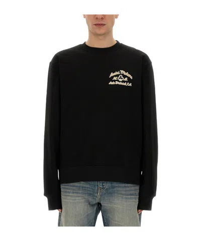 Amiri Round Collar Long Sleeve Sweater In Black
