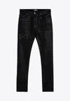 Amiri Skinny Jeans With Distressed Detailing And Five Pockets In Black