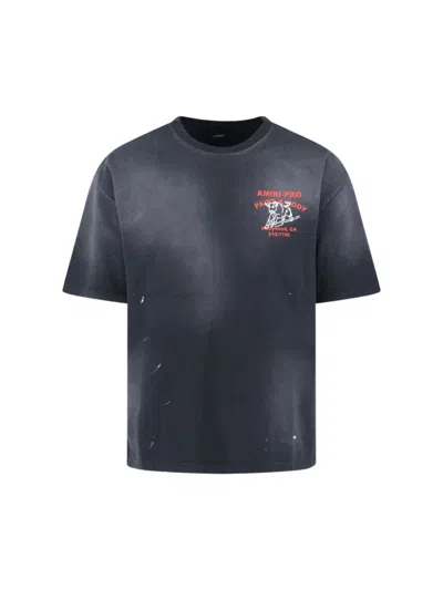 Amiri Short-sleeve T-shirt With Vintage Graphic And Distressed Finish In Blue