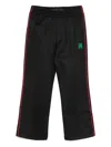 Amiri Side-stripe Track Pants In Black