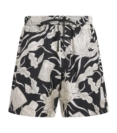 AMIRI SILK FLORAL PRINT SHORTS