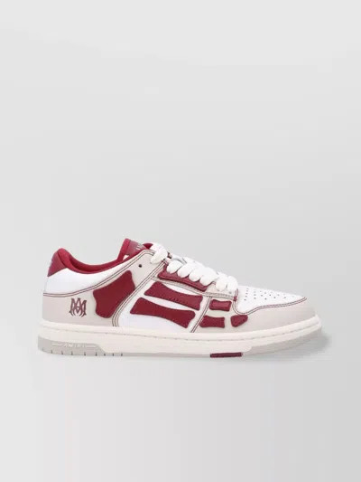 AMIRI SKEL LOW TOP SNEAKERS WITH MONOGRAM PRINT
