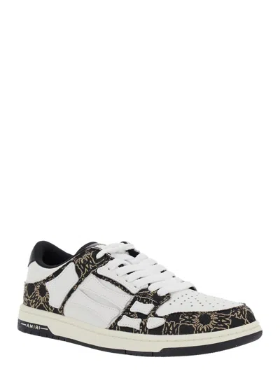 AMIRI 'SKEL TOP LOW' BLACK SNEAKER WITH SKELETON APPLICATIONS AND ALL-OVER LOGO PRINT IN LEATHER MAN