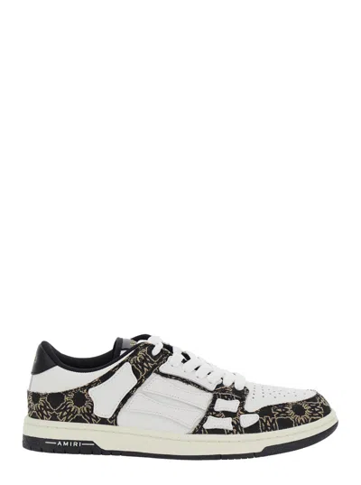 AMIRI AMIRI 'SKEL TOP LOW' BLACK SNEAKER WITH SKELETON APPLICATIONS AND ALL-OVER LOGO PRINT IN LEATHER MAN