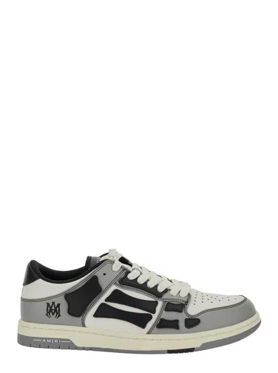 AMIRI 'SKEL TOP LOW' GREY SNEAKERS WITH LOGO PATCH ON THETONGUE AND CONTRASTING DETAILS ON THE SIDE IN LEA