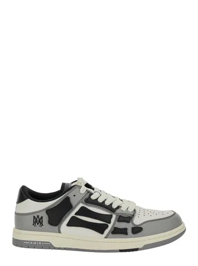AMIRI 'SKEL TOP LOW' GREY SNEAKERS WITH LOGO PATCH ON THETONGUE AND CONTRASTING DETAILS ON THE SIDE IN LEA