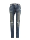 AMIRI SKINNY JEANS WITH DESTROYED EFFECT