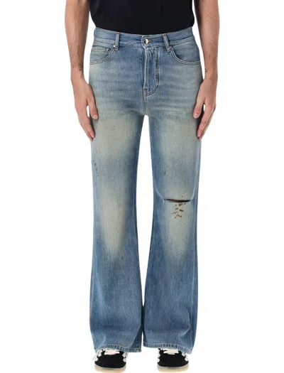 Amiri Slash Aged Wash Cut-knee Distressed Bootcut Jeans In Blue