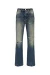 Amiri Slashed Boot Cut Jean In Blue
