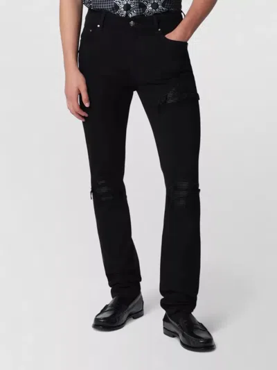 Amiri Slim Fit Mid Rise Ripped Denim Jeans In Black