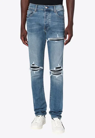 AMIRI SLIM-LEG RIPPED JEANS