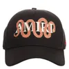 Amiri Snake Logo Embroidered Cotton Cap In Black