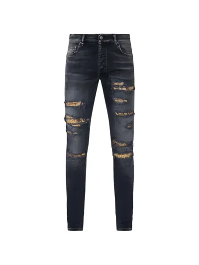 Amiri Snake Thrasher Skinny Jeans In Black