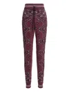 Amiri Space Dye Bandana Pants Purple In Red