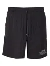 Amiri Elasticized Waist Knee Length Shorts With Print