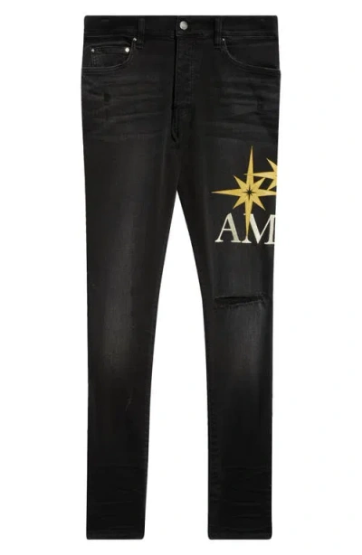 AMIRI AMIRI STARBURST APPLIQUÉ RIPPED SKINNY JEANS