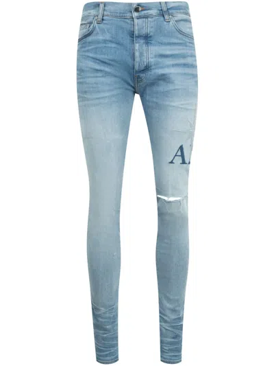 Amiri Starburst Applique Skinny Jeans In Blue