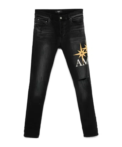 AMIRI STARBURST DECAL JEANS