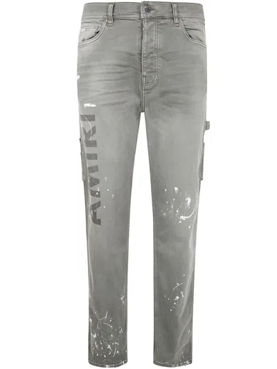 AMIRI AMIRI " STENCIL" SLIM JEANS