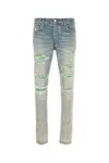 Amiri Distressed Stretch Denim Jeans With Faded Effect