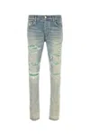 Amiri Distressed Stretch Denim Jeans With Faded Effect In Antiqueindigo