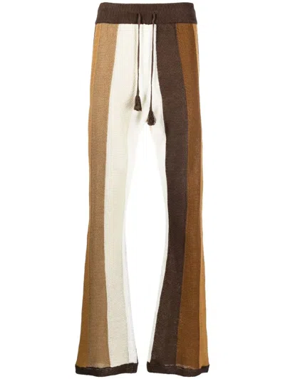 Amiri Striped Straight-leg Trousers In Brown