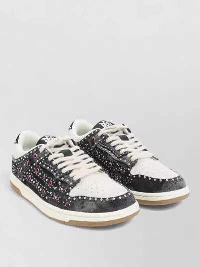 AMIRI STUDDED LOW-TOP SNEAKERS