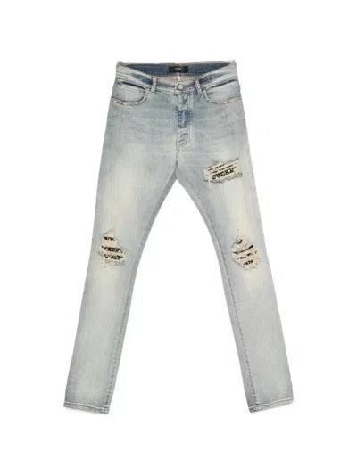 Amiri Stud-embellished Distressed Jeans In Blue