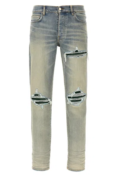 Amiri Mx1 Skinny-fit Panelled Distressed Jeans In Blue