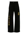 Amiri Flocked-logo Cotton Track Pants In Black