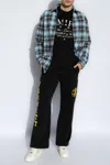 Amiri Flocked-logo Cotton Track Pants In Black