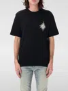 Amiri Starburst Graphic T-shirt In Schwarz