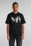 Amiri Logo T-shirt In Black