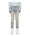 Amiri Distressed Stretch Denim Jeans With Faded Effect In Gray