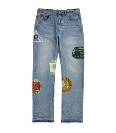 Amiri Travel Patch Jeans In Blue