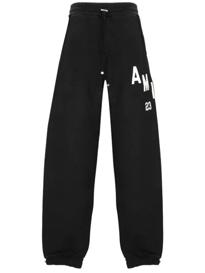 Amiri Trousers In Black