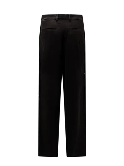 Amiri Trousers In Black