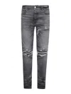 Amiri Distressed Grey Denim Jeans With Ripped Details In Gray