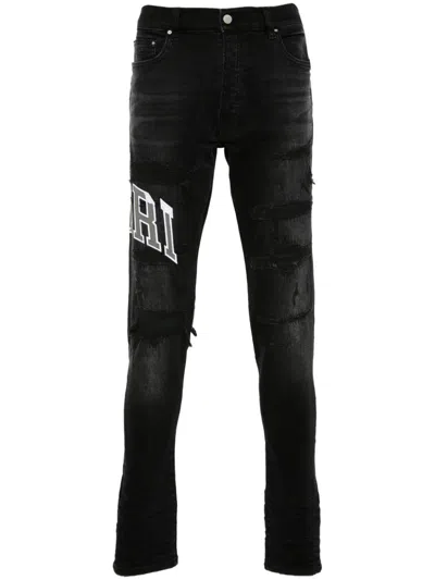 Amiri Logo Patch Distressed Skinny Jeans In Black