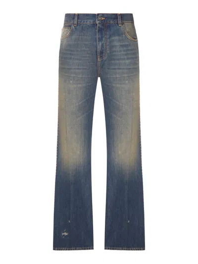 Amiri Vintage-effect Jeans With Side Details In Blue
