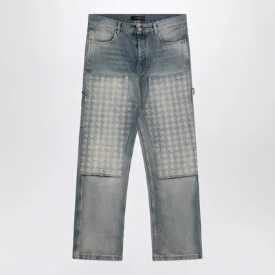 AMIRI AMIRI WASHED JEANS WITH DECORATIVE PANEL