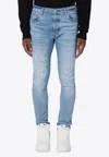 AMIRI WASHED SKINNY JEANS