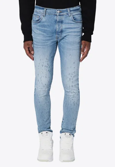 AMIRI WASHED SKINNY JEANS