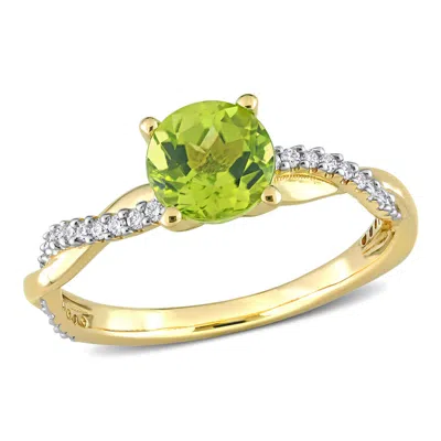 Amour 1 1/10 Ct Tgw Peridot And 1/6 Ct Tw Diamond Crossover Ring In 14k Yellow Gold In Metallic